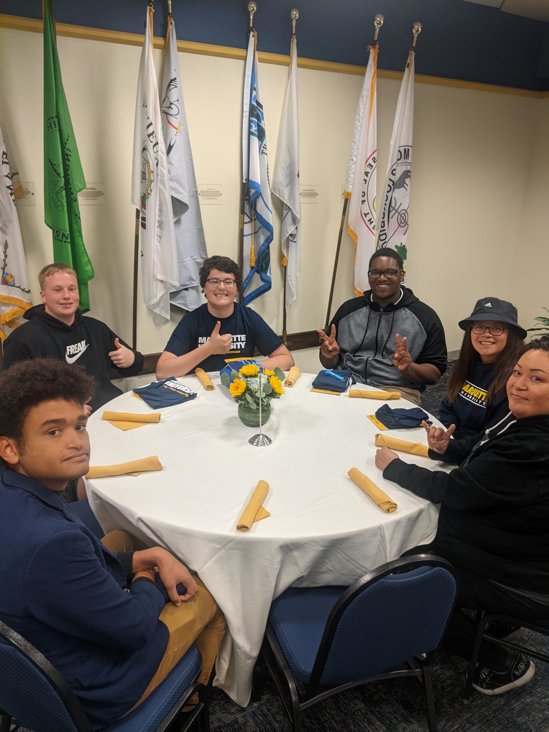 Students at table during Marquette University fall 2022 tour.