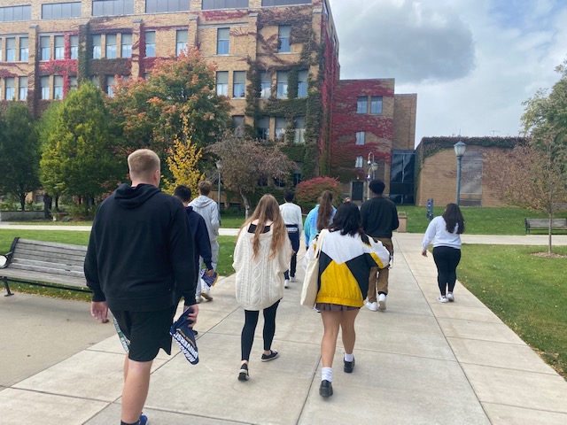 Students exploring Marquette University during campus tour.