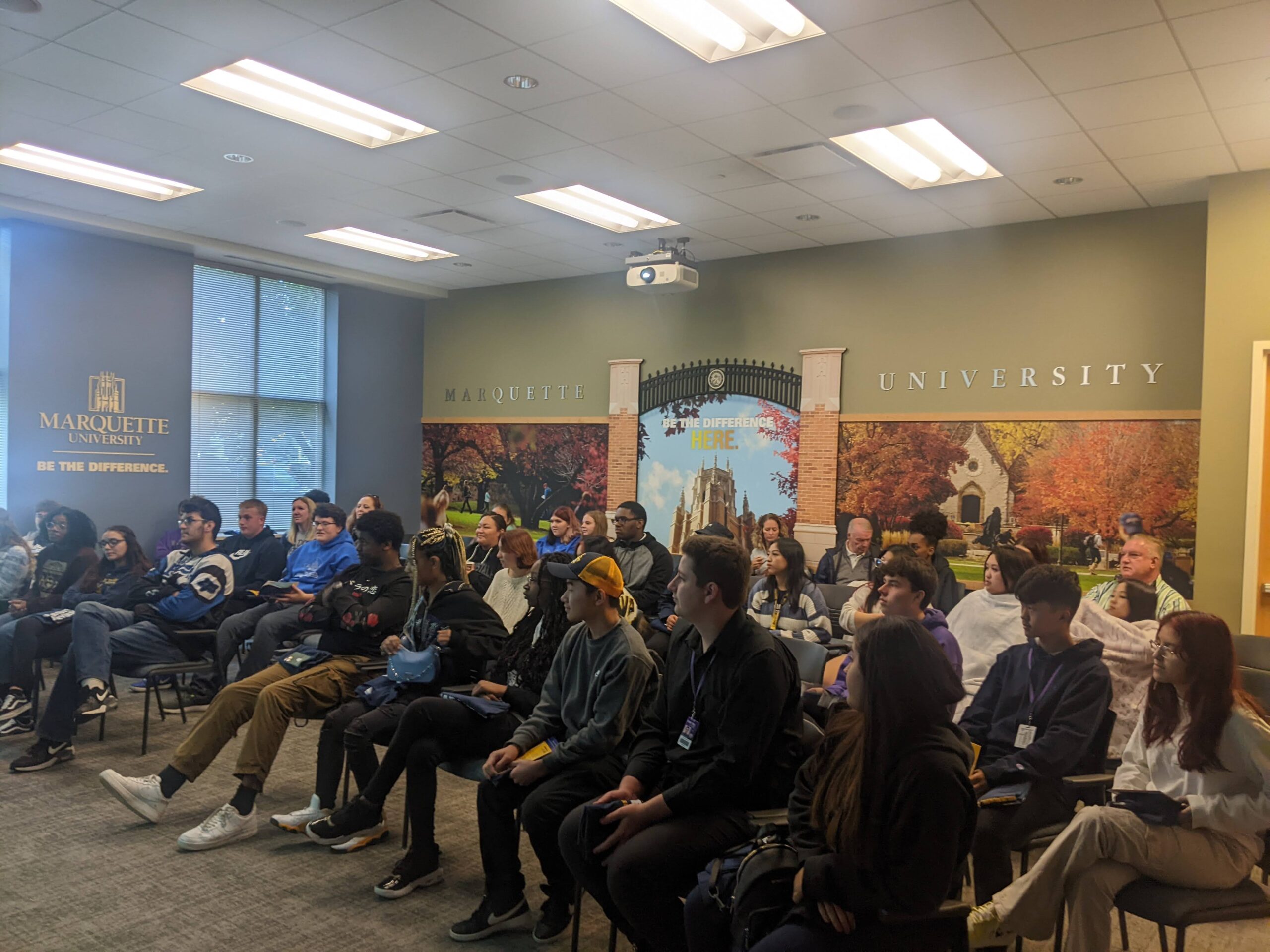 Students listening to presentation at Marquette University tour.