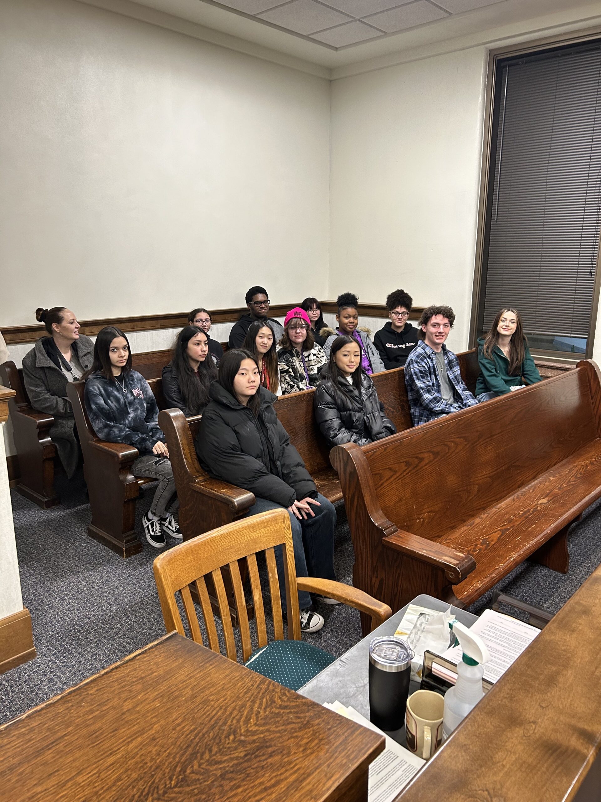 Green Bay West students in a courtroom in the Brown County Courthouse.