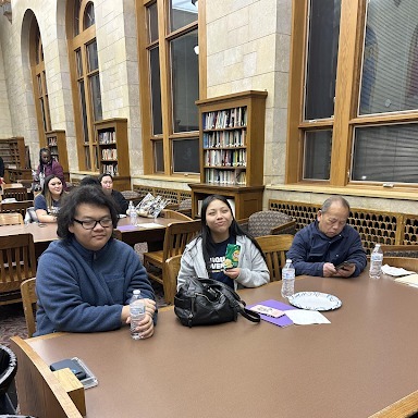 Students sitting at tables at financial aid night