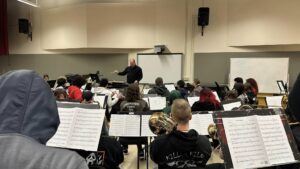 Green Bay West High School Band students attend an event at UW-Green Bay.