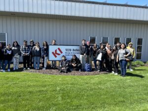 Green Bay West High School students tour KI Furniture.