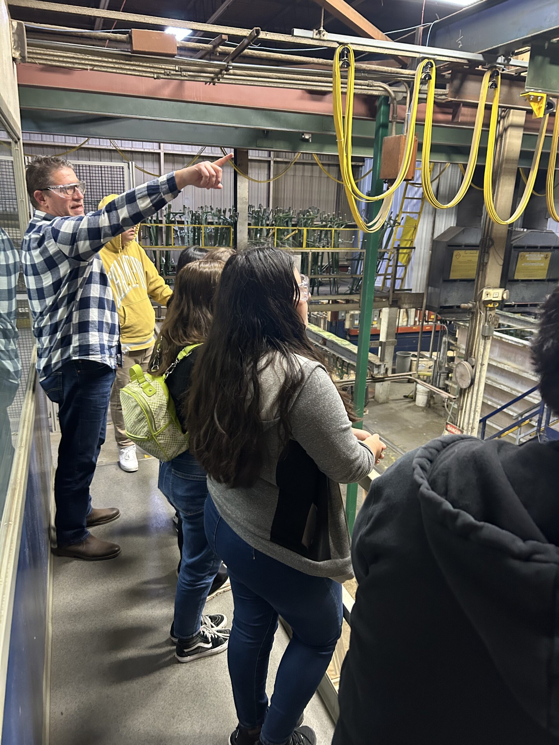 Students tour KI Furniture.