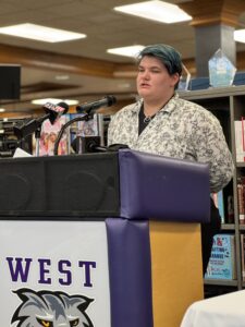 Axel Madaski speaks at the Do Great Things Initiative scholarship event.