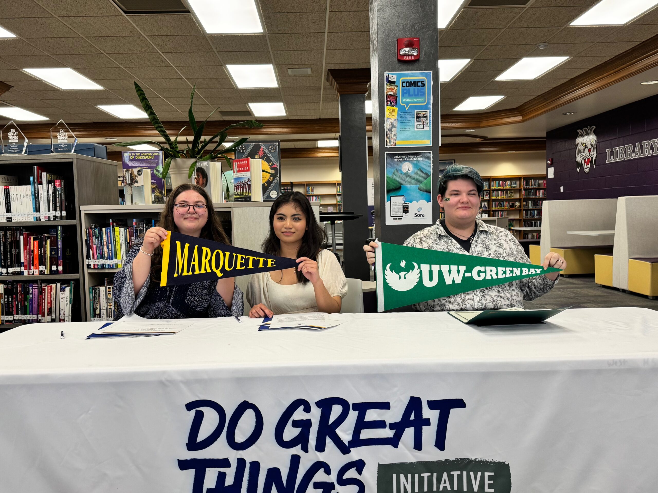 Students from Green bay West High School celebrate winning scholarships.