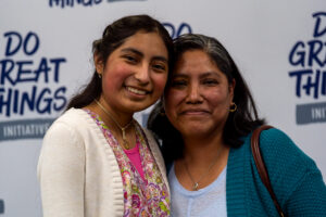 Adriana Flores Torres with her mom at the Do Great Things Initiative Scholarship celebration in 2026